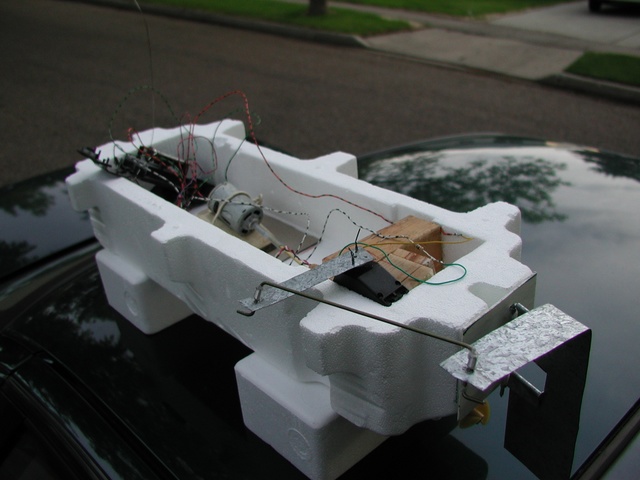 I got this piece of styrofoam from work;  it's the end piece for shipping computers.
Note the elegant display stand.