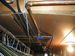 PC074932
Wiring & plumbing over lame particle-board!