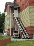 I just can't figure out what the boards on the steps + the little wooden cart are for.