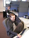 Pat gets comfortable uncomfortable at his new desk.