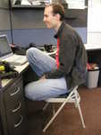 No he's not posing; that's Pat in his natural ergonomic work position.