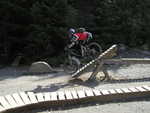 Tom tries out the teeter-totter at the Intermediate Skills park.